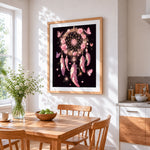 Pink dreamcatcher with roses cross stitch artwork displayed on wall as home decor
