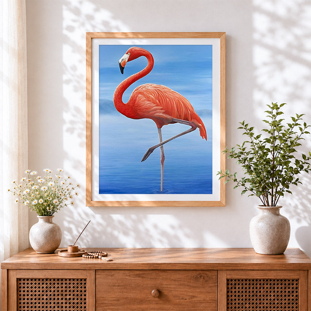 Finished pink flamingo on blue water paint by numbers artwork displayed as home decor