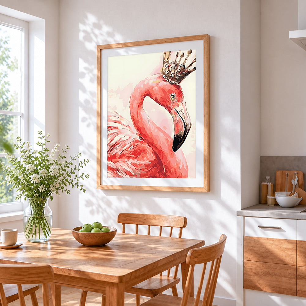 Pink flamingo with a crown cross stitch artwork displayed on wall as home decor
