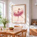 Pink floral ballerina cross stitch artwork displayed on wall as home decor