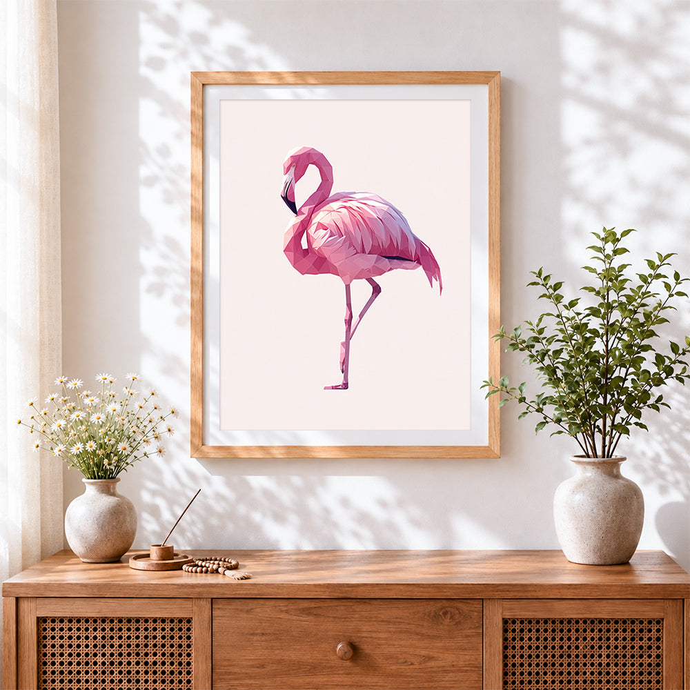 Finished pink geometric flamingo cross stitch artwork displayed