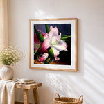 Pink lily flower close-up cross stitch artwork displayed on wall as home decor