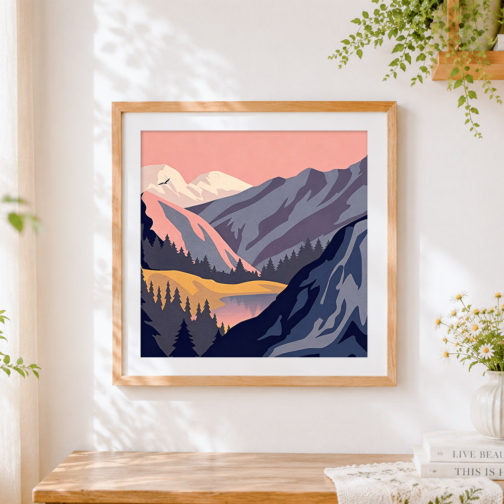 Finished pink mountain lake cross stitch artwork displayed