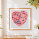 Finished pink multi language i love you heart cross stitch artwork displayed