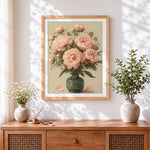 Finished pink peonies in a green vase cross stitch artwork displayed