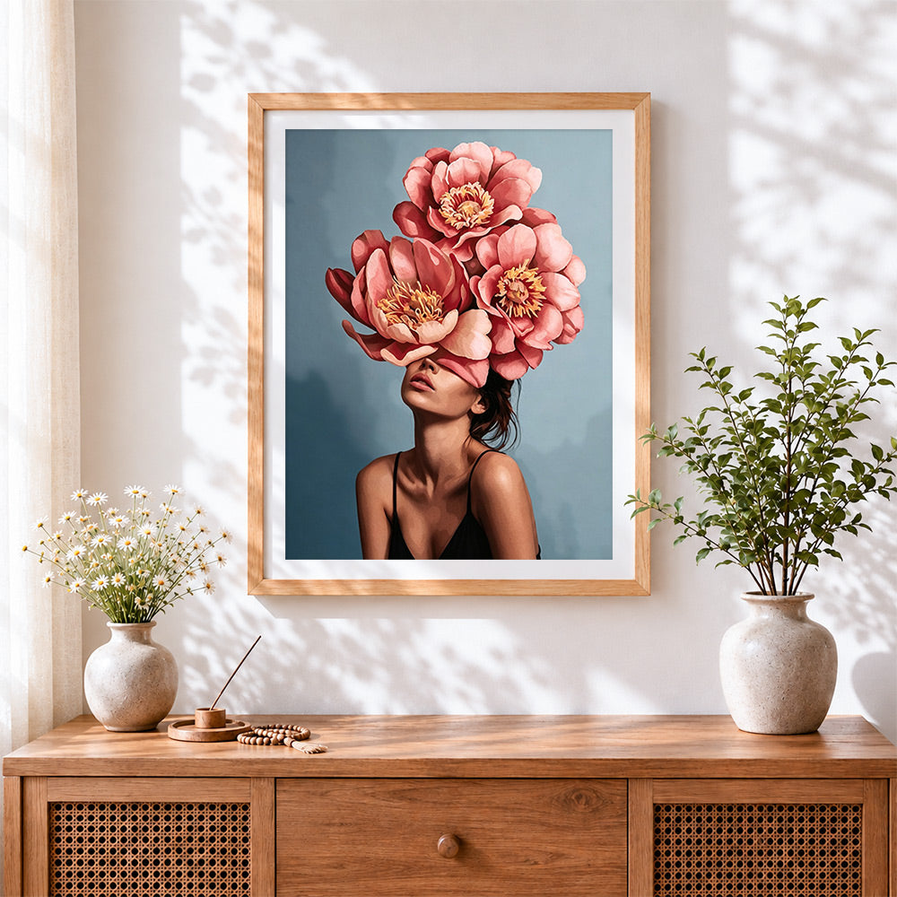 Finished pink peony lady cross stitch artwork displayed
