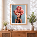 Finished pink peony lady cross stitch artwork displayed