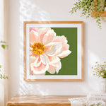 Finished pink peony on a green background cross stitch artwork displayed
