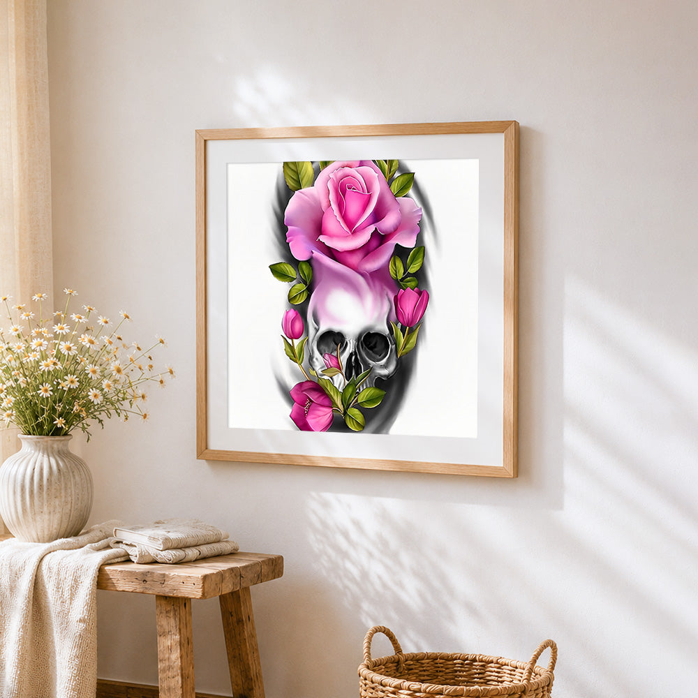 Pink roses and grey skull cross stitch artwork displayed on wall as home decor
