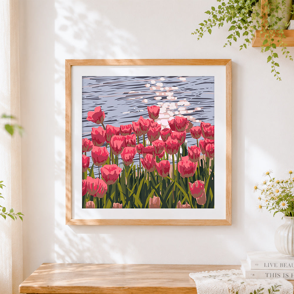 Finished pink tulips by the water cross stitch artwork displayed