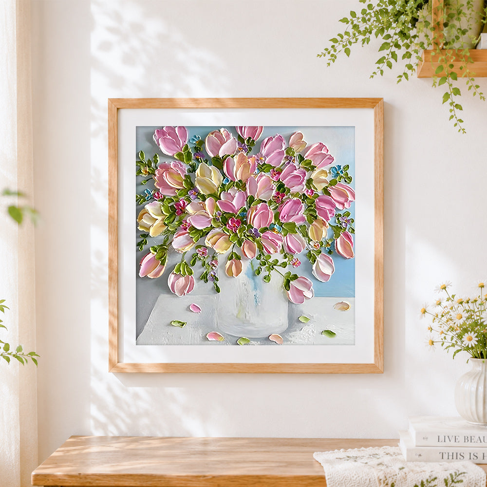 Finished pink tulips in a white vase cross stitch artwork displayed