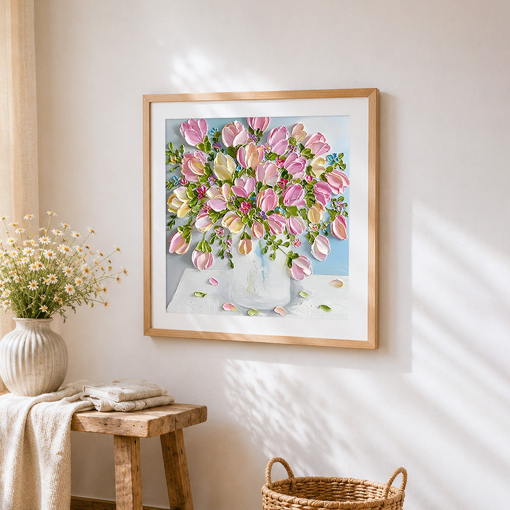 Pink tulips in a white vase cross stitch artwork displayed on wall as home decor