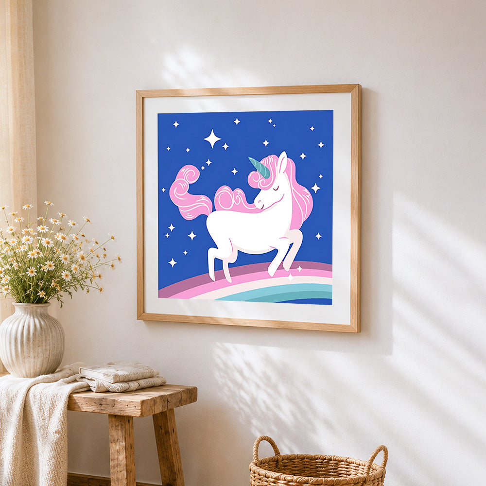 Pink unicorn galloping in the stars cross stitch artwork displayed on wall as home decor