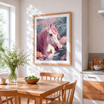 Pink unicorn in floral garden cross stitch artwork displayed on wall as home decor