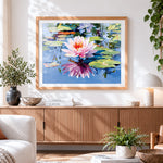 Finished pink water lily with reflection cross stitch artwork displayed