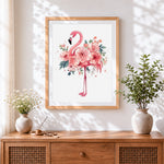 Finished pink watercolour floral flamingo cross stitch artwork displayed