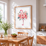 Pink watercolour floral flamingo cross stitch artwork displayed on wall as home decor