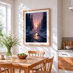 Pink winter forest sunset cross stitch artwork displayed on wall as home decor