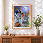 Finished pirate mouse and cat cross stitch artwork displayed