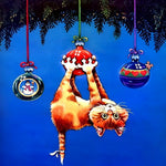 Playful cat hanging from christmas baubles cross stitch kit for beginners