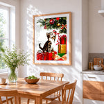 Playful kitten and christmas presents cross stitch artwork displayed on wall as home decor