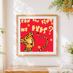 Finished playful leopard "can you find my eyes?" cross stitch artwork displayed