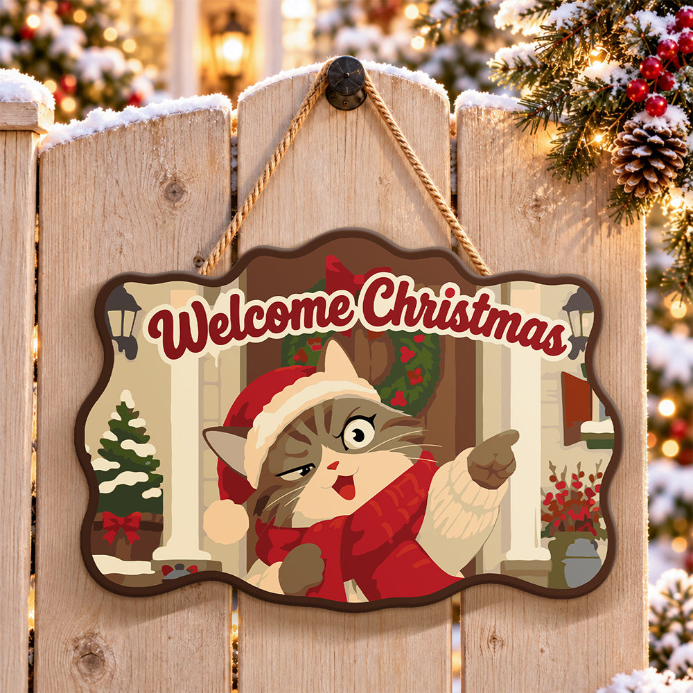 Pointing santa cat paint by numbers door hanger on a garden gate