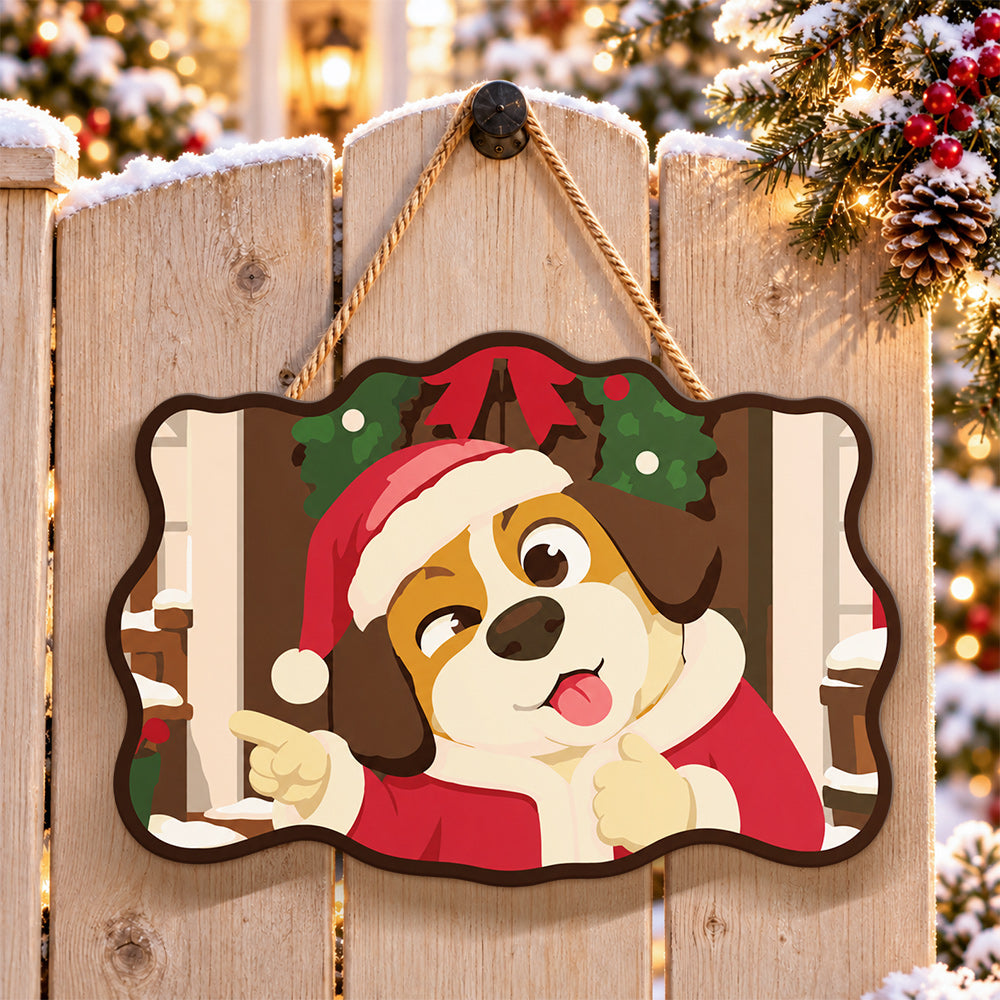 Pointing santa dog paint by numbers door hanger on a garden gate