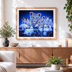 Finished polar animal cubs collage cross stitch artwork displayed