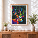 Finished pop art colourful stag cross stitch artwork displayed