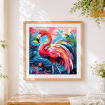 Finished pop art flamingo cross stitch artwork displayed