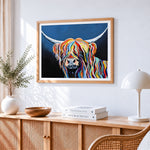 Pop art rainbow highland cow paint by numbers artwork displayed on wall as home decor