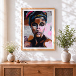 Finished pop art style african woman cross stitch artwork displayed