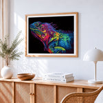 Pop art style iguana head cross stitch artwork displayed on wall as home decor