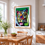Pop art tiger on green background cross stitch artwork displayed on wall as home decor