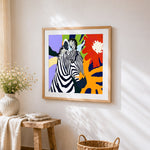 Pop art zebra cross stitch artwork displayed on wall as home decor