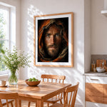 Portrait of a man in orange hood cross stitch artwork displayed on wall as home decor