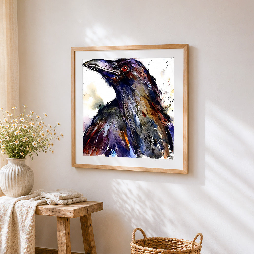 Portrait of a raven cross stitch artwork displayed on wall as home decor