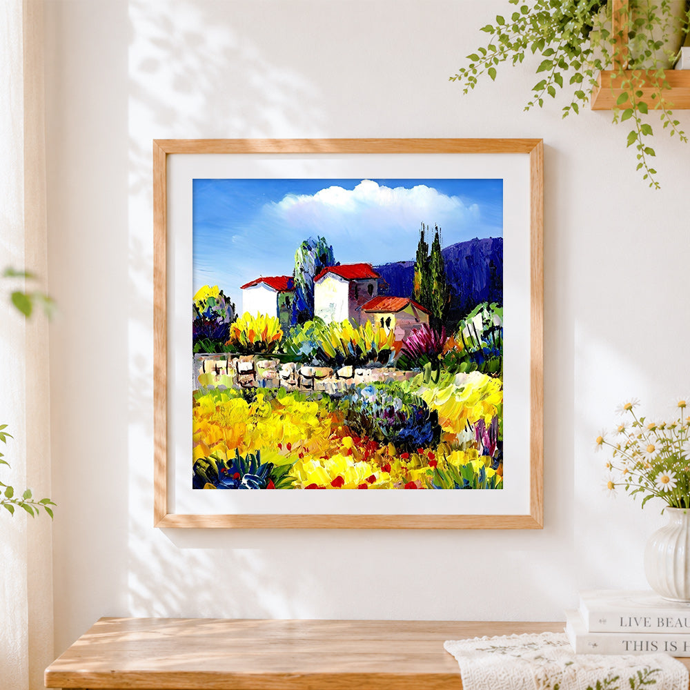 Finished post impressionist village cross stitch artwork displayed