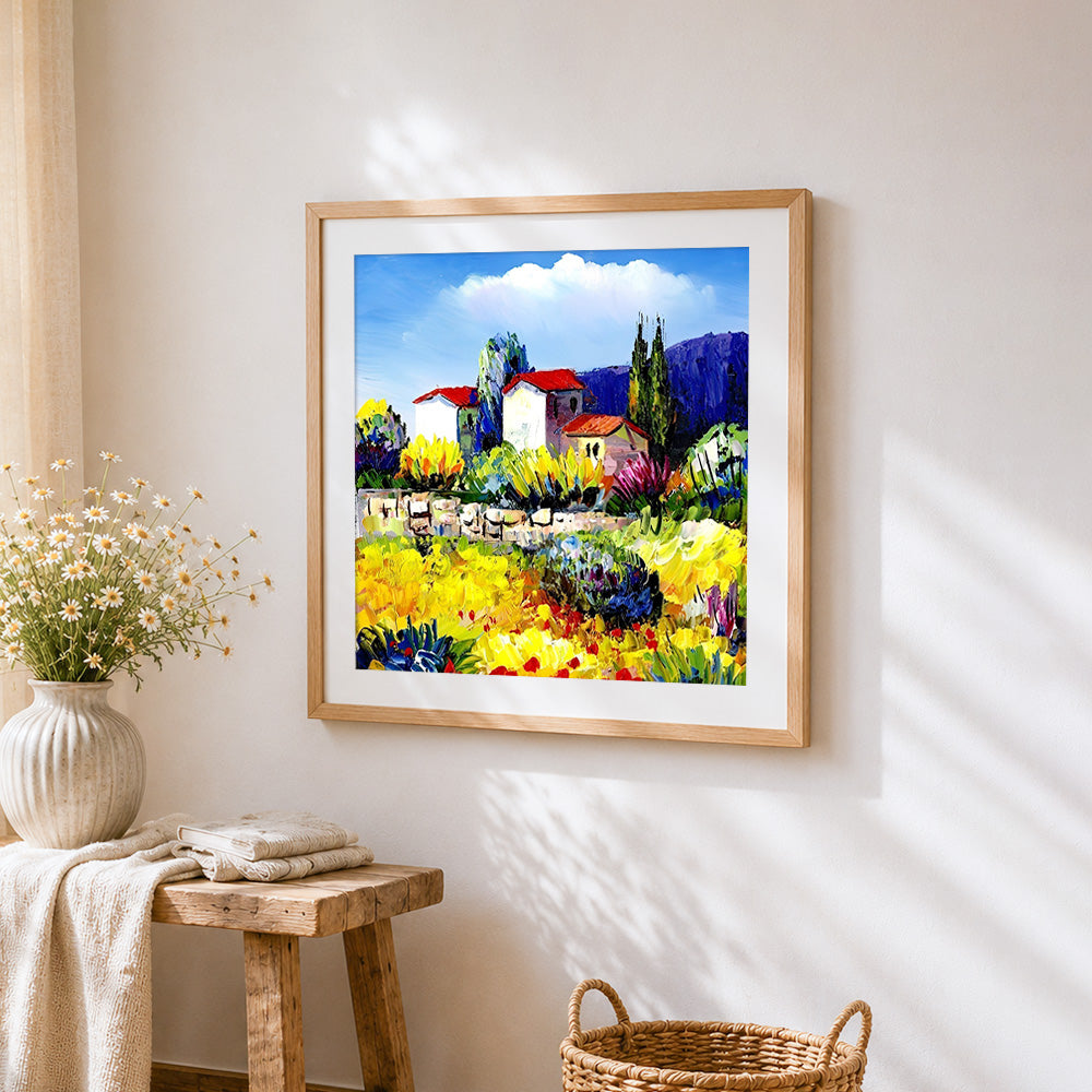 Post impressionist village cross stitch artwork displayed on wall as home decor