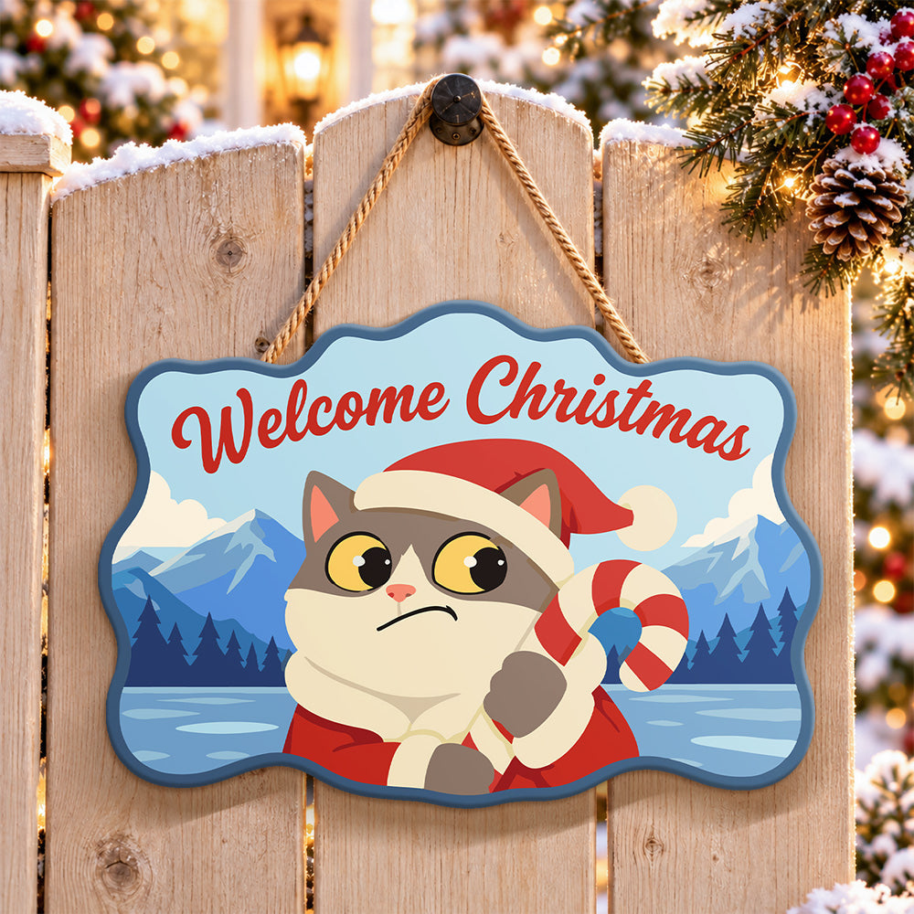 Pouty cat with candy cane paint by numbers door hanger on a garden gate