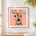 Finished pretty floral deer cross stitch artwork displayed
