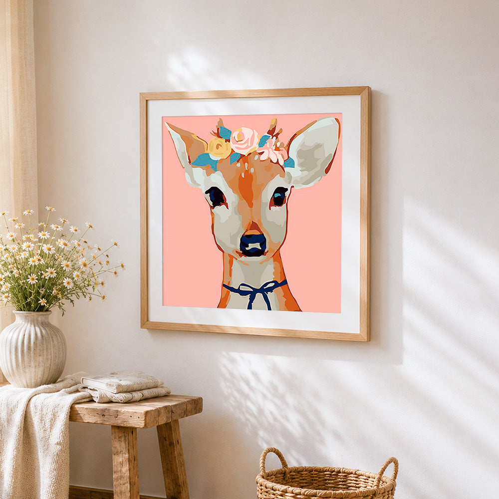 Pretty floral deer cross stitch artwork displayed on wall as home decor