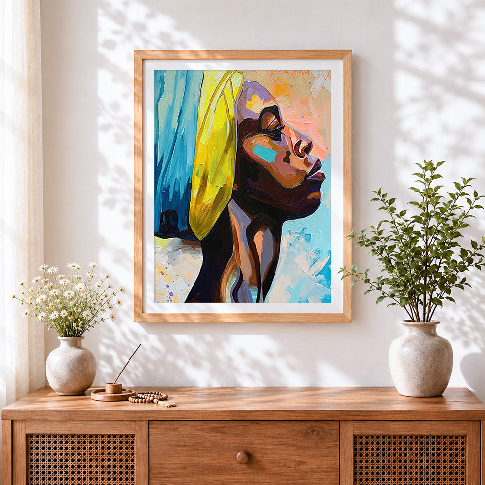 Finished profile of woman with yellow headwrap cross stitch artwork displayed