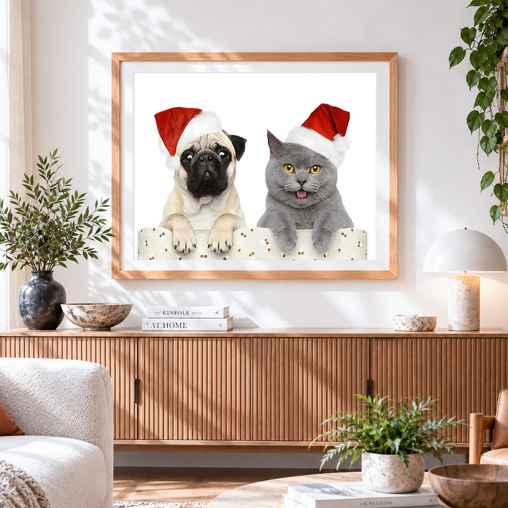Finished pug and grey cat in santa hats cross stitch artwork displayed