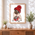 Finished pug in a bobble hat with hot chocolate cross stitch artwork displayed