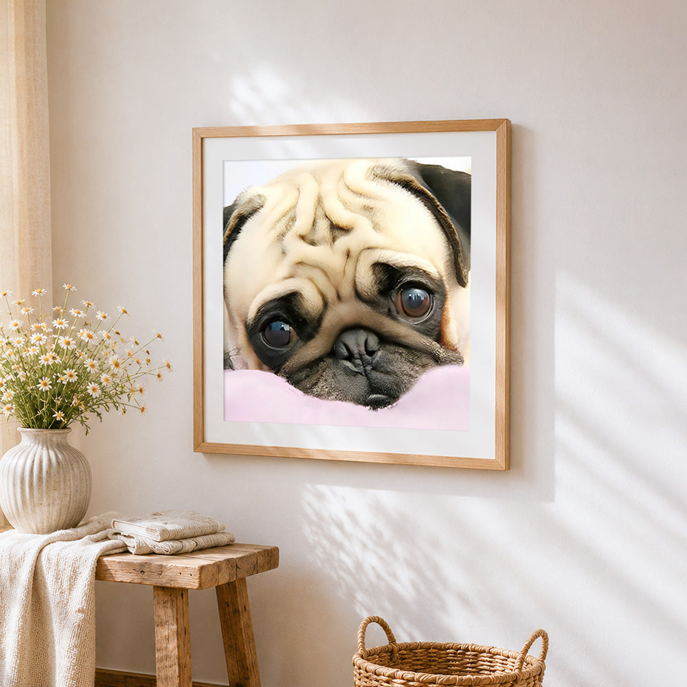 Pug resting on a pink pillow cross stitch artwork displayed on wall as home decor