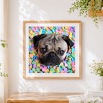 Finished pug surrounded by colourful hearts cross stitch artwork displayed