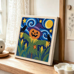 Pumpkin head scarecrow punch needle artwork displayed on a table