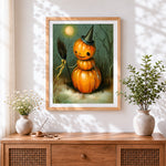 Finished pumpkin snowman with witch hat and broom cross stitch artwork displayed